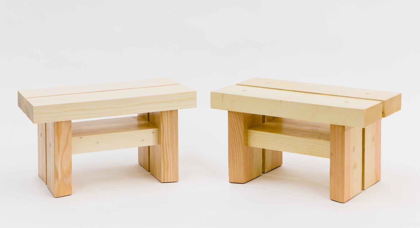 two foot benches with white wood tops and douglas fir legs - side perspective